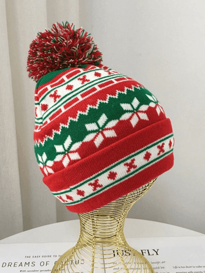Knitted Christmas hat with jacquard pompoms