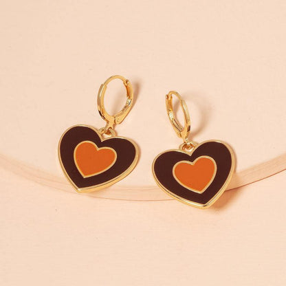 Heart-shaped dangling earrings