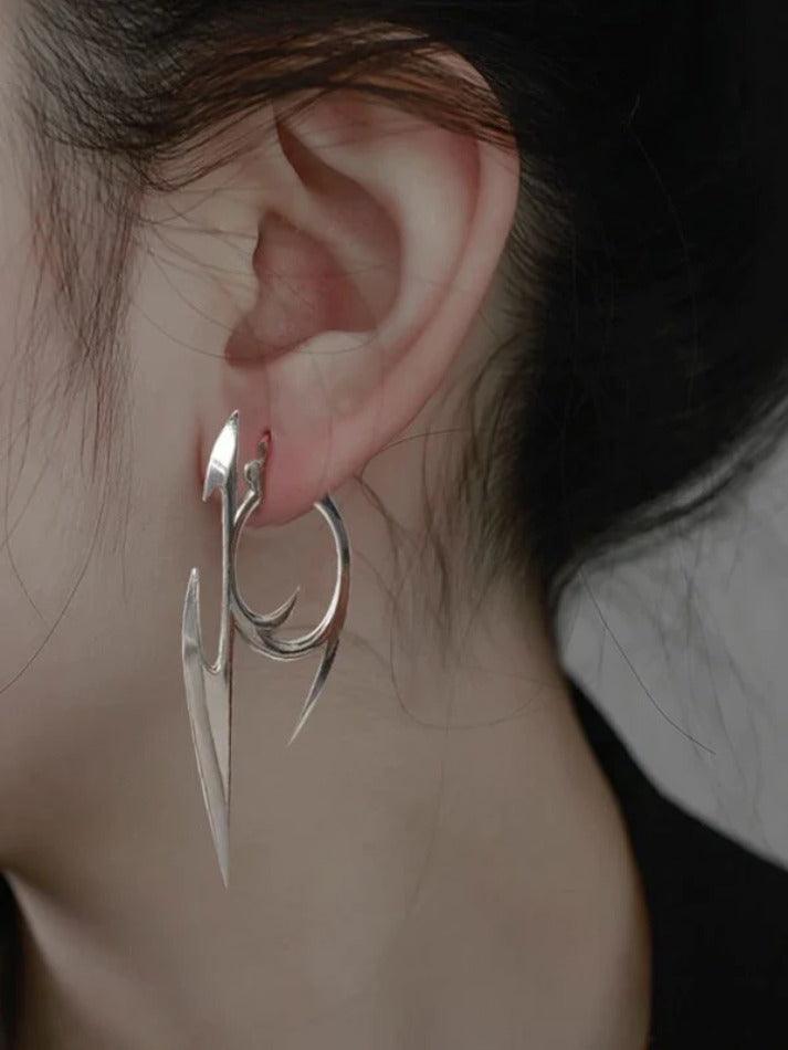Silver punk character earrings