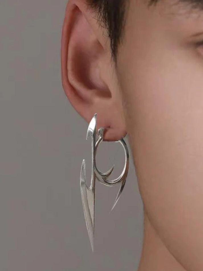 Silver punk character earrings