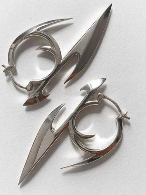 Silver punk character earrings