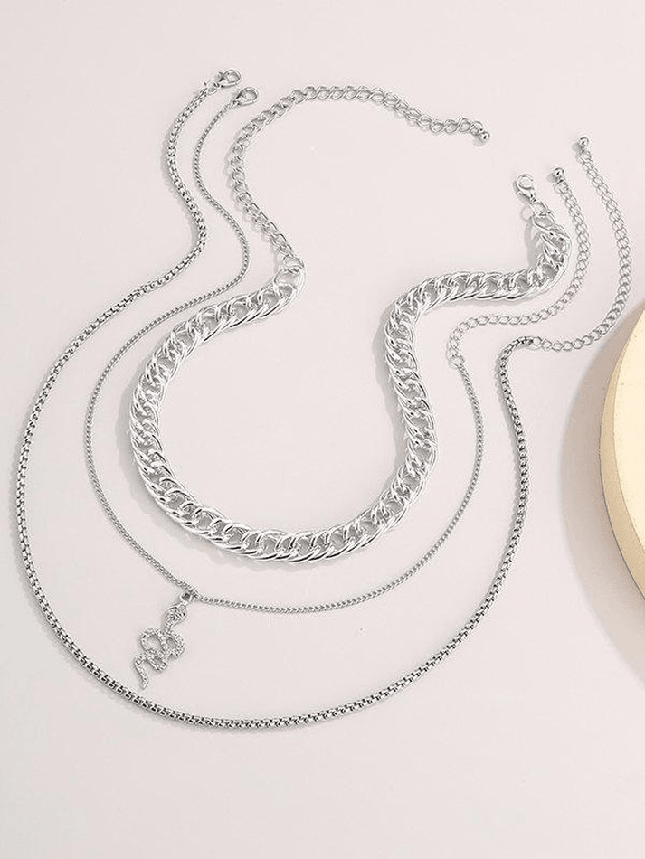 Multilayer necklace with snake decoration