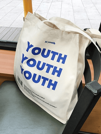 Graphic canvas tote bag with letter for young people