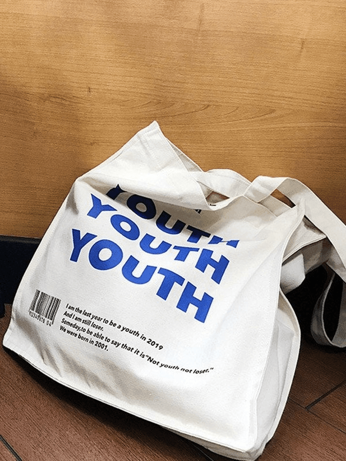 Graphic canvas tote bag with letter for young people